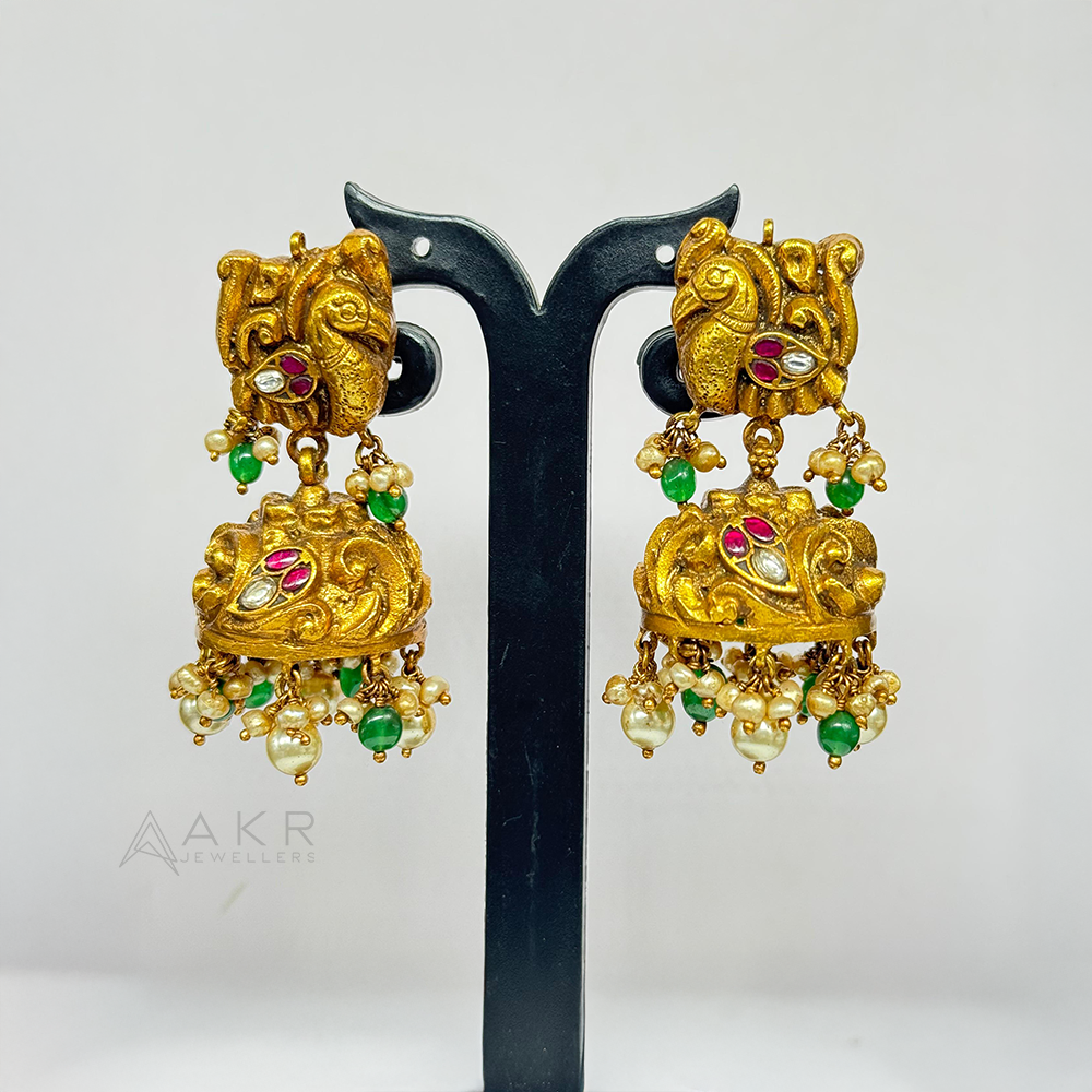 Antique Peacock Buttalu