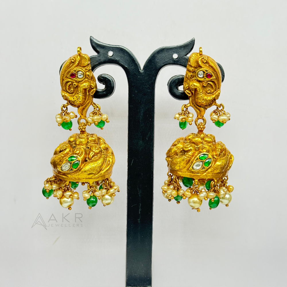 Antique Peacock Buttalu